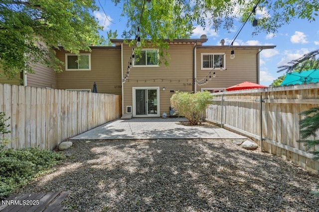 423 Barclay Ct, Reno, NV 89511 - rear view of house with a patio area and a fenced backyard