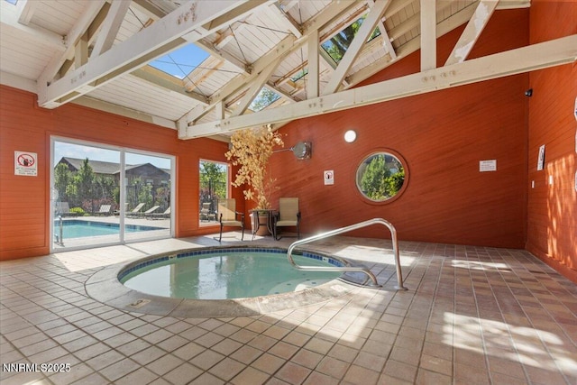 423 Barclay Ct, Reno, NV 89511 - indoor pool featuring a hot tub and a skylight