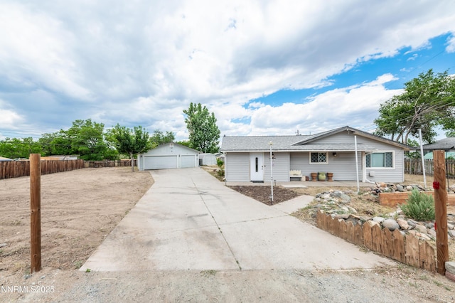 9365 Gremlin Way, Reno, NV 89506 - single story home featuring a detached garage and an outdoor structure
