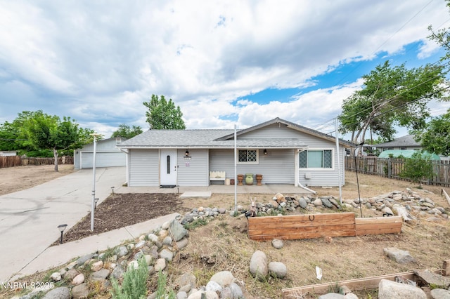 9365 Gremlin Way, Reno, NV 89506 - ranch-style house with a detached garage