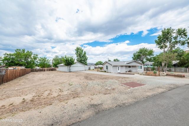 9365 Gremlin Way, Reno, NV 89506 - view of yard featuring a garage