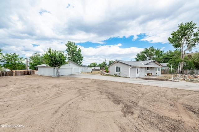 9365 Gremlin Way, Reno, NV 89506 - view of front of house with a garage and an outdoor structure