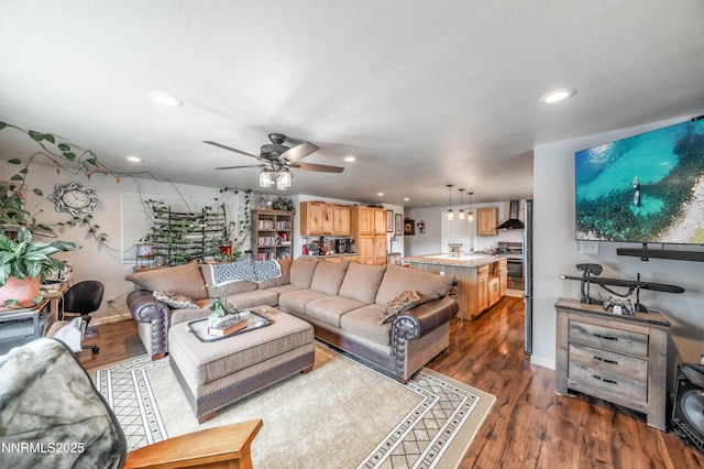9365 Gremlin Way, Reno, NV 89506 - living area featuring recessed lighting, a ceiling fan, dark wood-type flooring, and baseboards