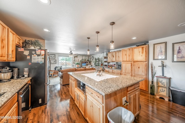 9365 Gremlin Way, Reno, NV 89506 - kitchen with dark wood-style floors, open floor plan, light stone countertops, a center island, and recessed lighting