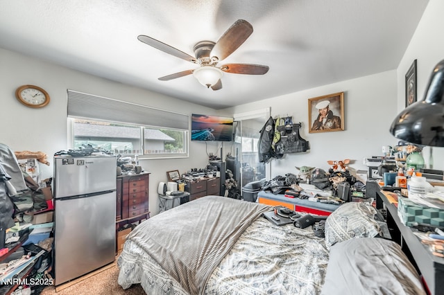 9365 Gremlin Way, Reno, NV 89506 - bedroom featuring freestanding refrigerator, carpet floors, and ceiling fan