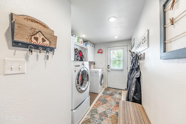 9365 Gremlin Way, Reno, NV 89506 - laundry area with washing machine and dryer, recessed lighting, cabinet space, and light wood finished floors