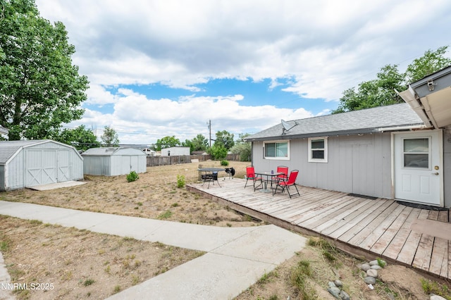 9365 Gremlin Way, Reno, NV 89506 - view of yard with a deck and outdoor dining space