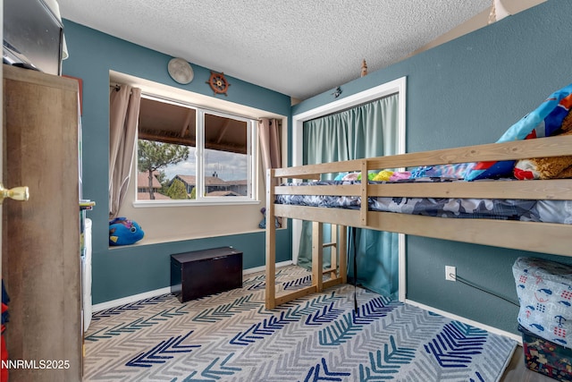 7090 Peppermint Dr, Reno, NV 89506 - bedroom with a textured ceiling and baseboards