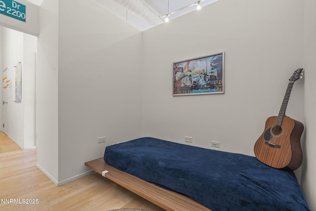 255 N Sierra St Unit 305, Reno, NV 89501 - bedroom with wood finished floors and baseboards