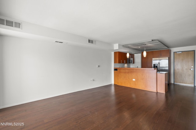 255 N Sierra St Unit 2113, Reno, NV 89501 - unfurnished living room featuring dark wood finished floors