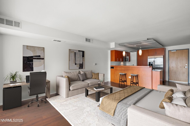 255 N Sierra St Unit 2113, Reno, NV 89501 - living area with wood finished floors and a desk