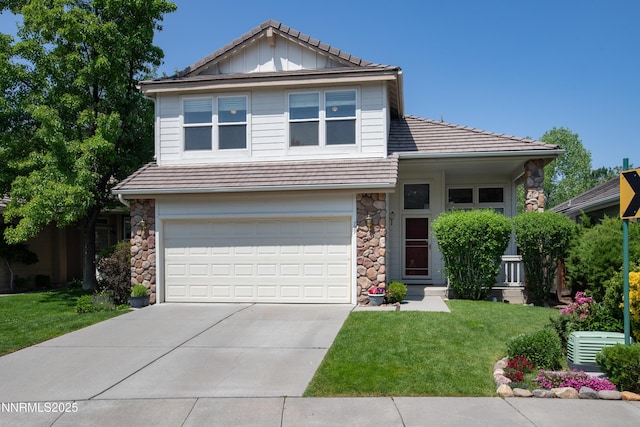 799 Caughlin Gln, Reno, NV 89519 - view of front of property featuring stone siding, driveway, a front lawn, an attached garage, and board and batten siding