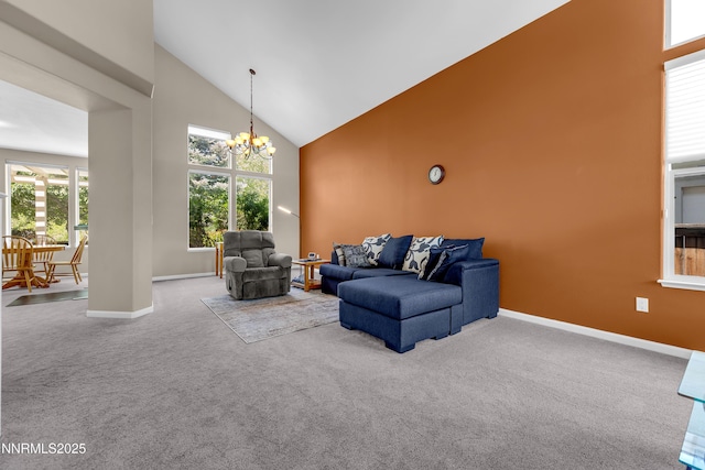 799 Caughlin Gln, Reno, NV 89519 - living area with high vaulted ceiling, carpet, baseboards, and a chandelier