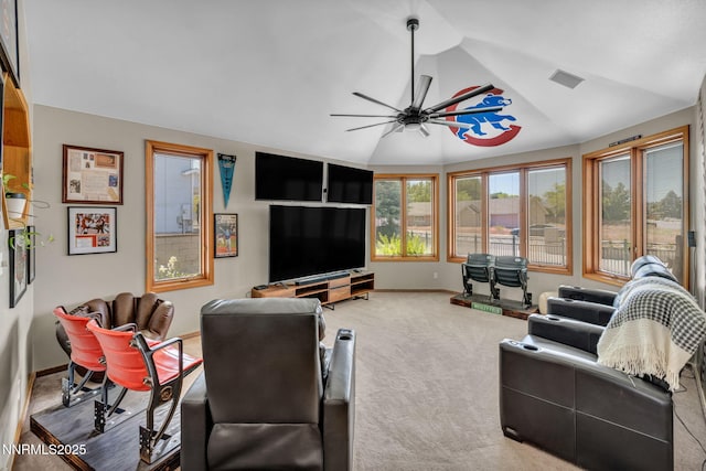 5595 Kluncy Canyon Rd, Winnemucca, NV 89445 - living room featuring vaulted ceiling, a ceiling fan, baseboards, and carpet floors