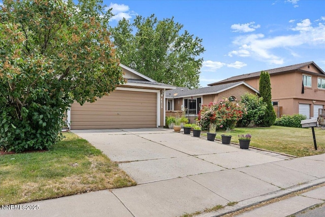 4415 Leche Way, Reno, NV 89502 - view of front facade with an attached garage, a front lawn, and concrete driveway