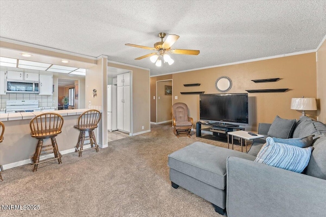 4415 Leche Way, Reno, NV 89502 - living room featuring light colored carpet, ornamental molding, a textured ceiling, a ceiling fan, and baseboards
