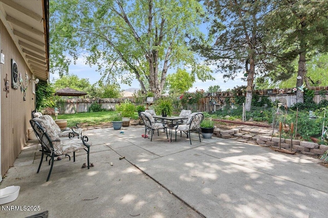 4415 Leche Way, Reno, NV 89502 - fenced backyard featuring outdoor dining area and a patio area