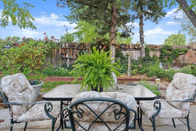 4415 Leche Way, Reno, NV 89502 - fenced backyard featuring outdoor dining area and a patio