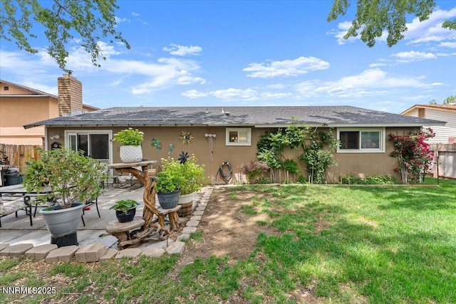 4415 Leche Way, Reno, NV 89502 - back of property with a patio and roof with shingles