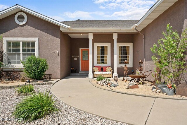 1055 Golden Park Way, Fallon, NV 89406 - entrance to property with stucco siding and a porch