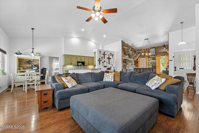 1055 Golden Park Way, Fallon, NV 89406 - living room with dark wood-type flooring, a ceiling fan, and high vaulted ceiling