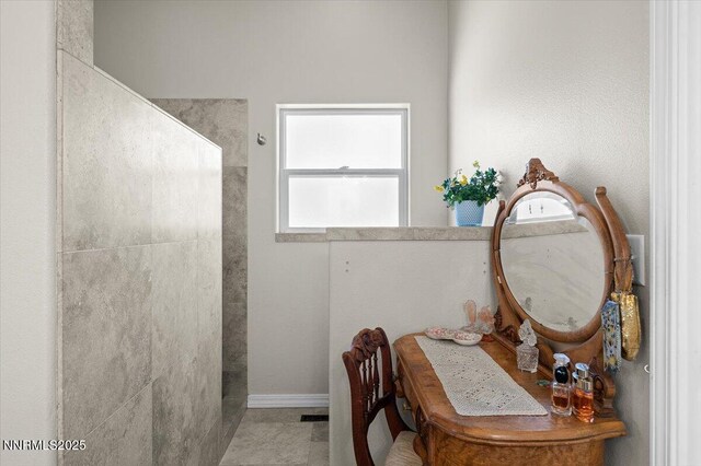 1055 Golden Park Way, Fallon, NV 89406 - bathroom featuring walk in shower and baseboards