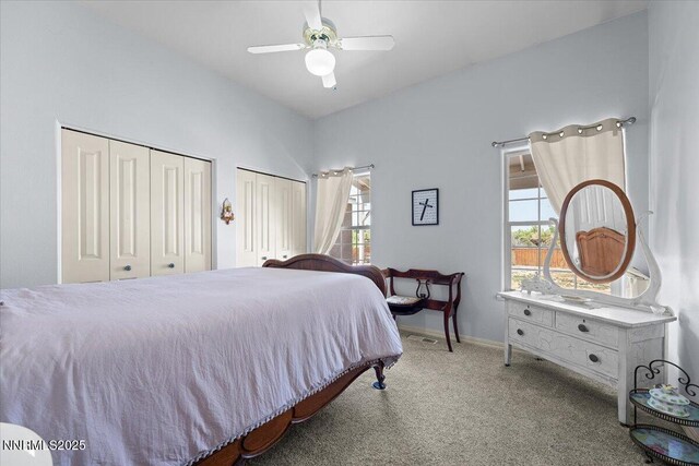 1055 Golden Park Way, Fallon, NV 89406 - carpeted bedroom with two closets, baseboards, and ceiling fan