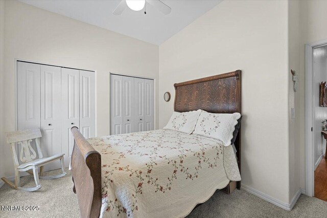 1055 Golden Park Way, Fallon, NV 89406 - bedroom featuring carpet flooring, two closets, vaulted ceiling, baseboards, and ceiling fan