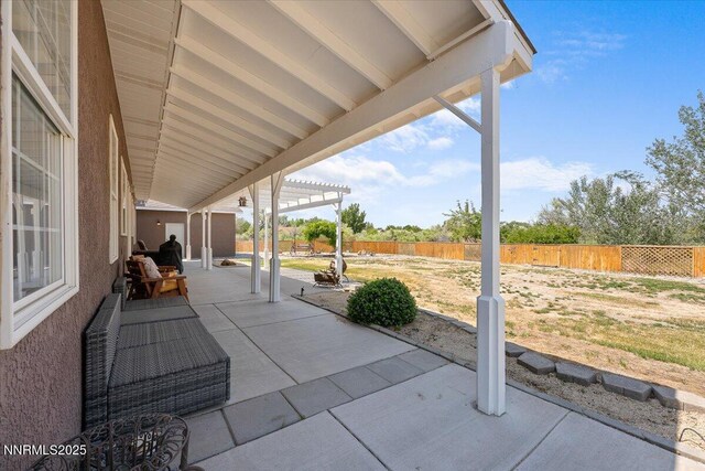 1055 Golden Park Way, Fallon, NV 89406 - fenced backyard with a patio and a pergola