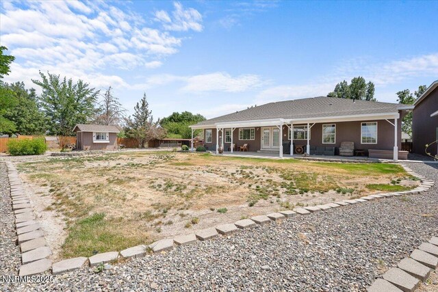 1055 Golden Park Way, Fallon, NV 89406 - back of house featuring french doors and a patio