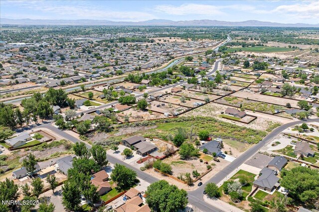1055 Golden Park Way, Fallon, NV 89406 - aerial overview of property's location with a mountain backdrop and nearby suburban area