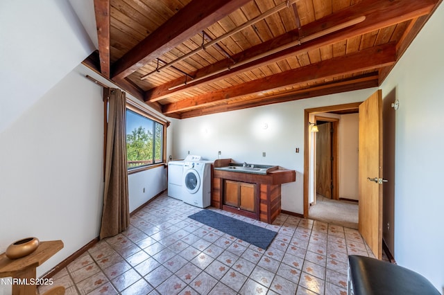 15118 N Timberline Dr, Reno, NV 89511 - laundry room with wooden ceiling, washer and clothes dryer, baseboards, cabinet space, and light tile patterned flooring