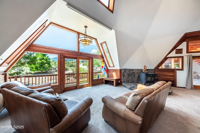 15118 N Timberline Dr, Reno, NV 89511 - carpeted living room with a wood stove, plenty of natural light, and high vaulted ceiling