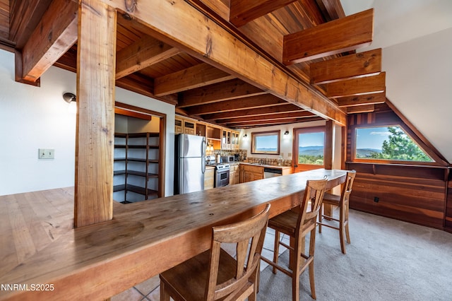 15118 N Timberline Dr, Reno, NV 89511 - dining room with wooden ceiling with exposed beams and light colored carpet