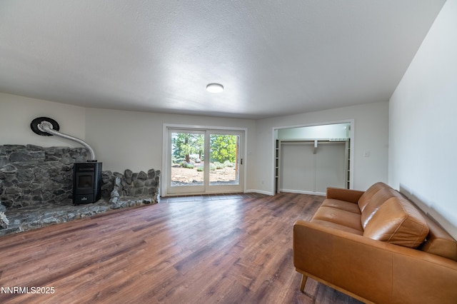15118 N Timberline Dr, Reno, NV 89511 - living room featuring a wood stove and wood finished floors