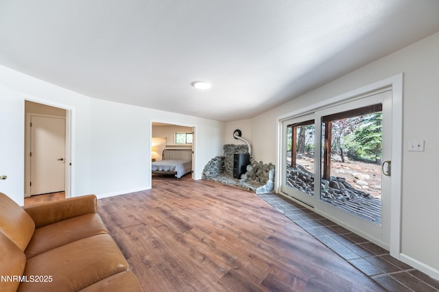 15118 N Timberline Dr, Reno, NV 89511 - unfurnished living room featuring wood finished floors and baseboards