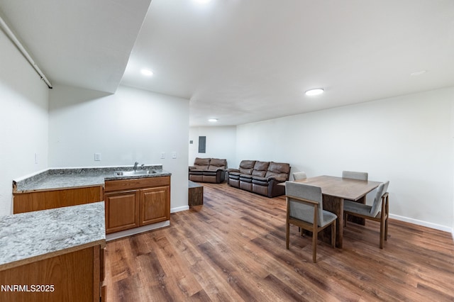 15118 N Timberline Dr, Reno, NV 89511 - dining space with wood finished floors, baseboards, and recessed lighting