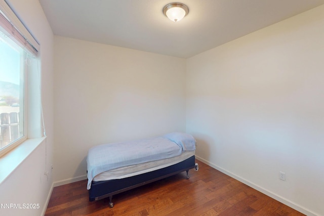1509 Lasso Ln, Gardnerville, NV 89410 - bedroom featuring wood finished floors and baseboards