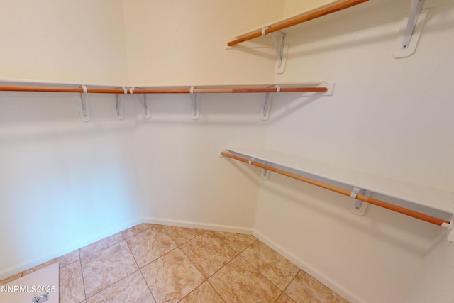 1509 Lasso Ln, Gardnerville, NV 89410 - spacious closet featuring light tile patterned floors
