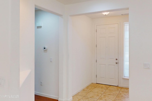 1509 Lasso Ln, Gardnerville, NV 89410 - entryway with baseboards and light tile patterned flooring