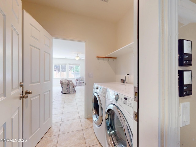 1509 Lasso Ln, Gardnerville, NV 89410 - laundry area with independent washer and dryer, light tile patterned flooring, and ceiling fan