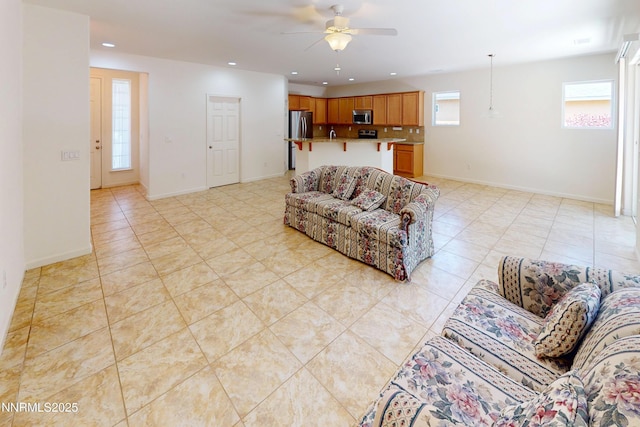 1509 Lasso Ln, Gardnerville, NV 89410 - living area featuring ceiling fan, light tile patterned floors, recessed lighting, and baseboards