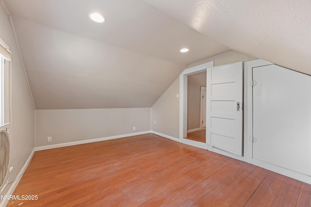 621 9th St, Sparks, NV 89431 - bonus room featuring light wood-style floors, lofted ceiling, baseboards, and recessed lighting