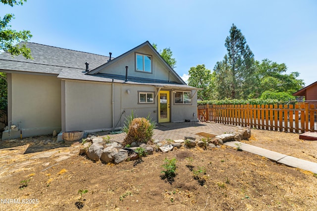 621 9th St, Sparks, NV 89431 - view of front of home with a patio area, roof with shingles, and stucco siding