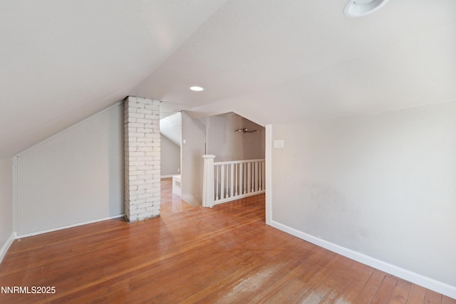 621 9th St, Sparks, NV 89431 - bonus room featuring lofted ceiling, wood finished floors, and baseboards
