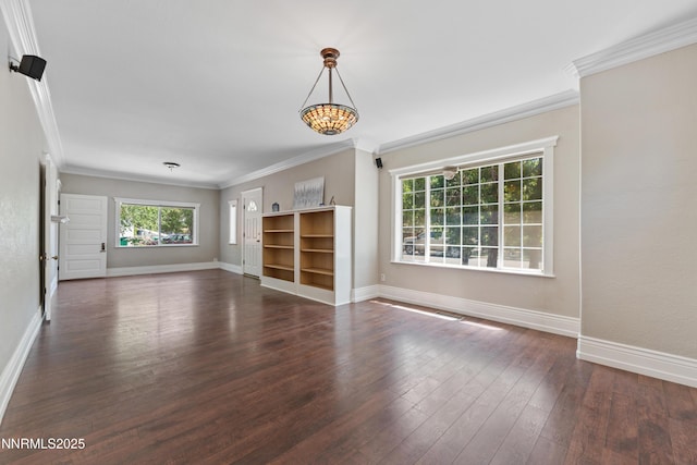 621 9th St, Sparks, NV 89431 - unfurnished living room with dark wood-type flooring, crown molding, and baseboards