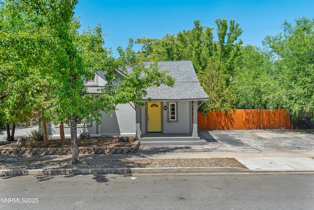 621 9th St, Sparks, NV 89431 - view of front of property with stucco siding and a shingled roof