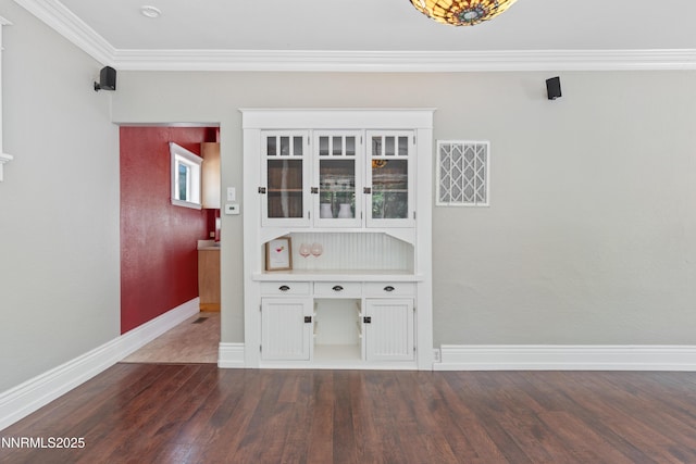 621 9th St, Sparks, NV 89431 - bar area with dark wood-style floors, ornamental molding, and baseboards