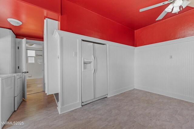 621 9th St, Sparks, NV 89431 - empty room featuring a ceiling fan, a wainscoted wall, and tile patterned floors
