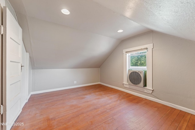 621 9th St, Sparks, NV 89431 - bonus room featuring light wood-type flooring, vaulted ceiling, baseboards, and recessed lighting